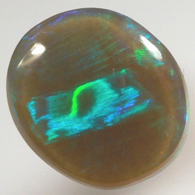 SOLID SEMI BLACK OPAL Large rolling flash of tropical green and blue